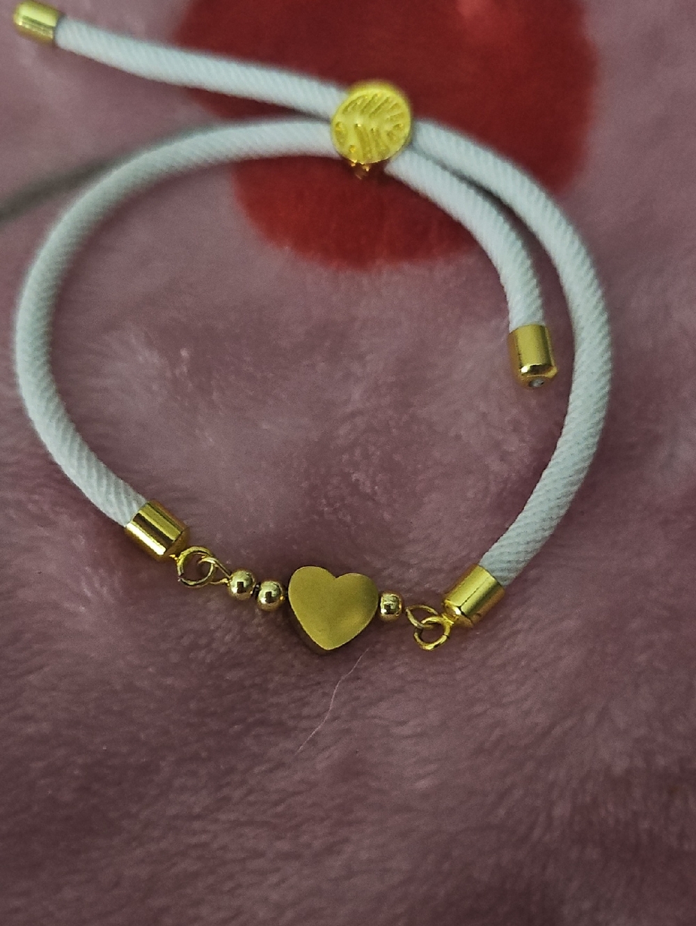 Gold Heart Bracelet on White Cord